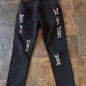 Source Unknown Black Skinny Jeans with Distressed Fringe Panels